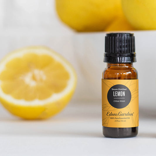 Edens Garden lemon essential oil bottle label visible for purity and aroma clarity