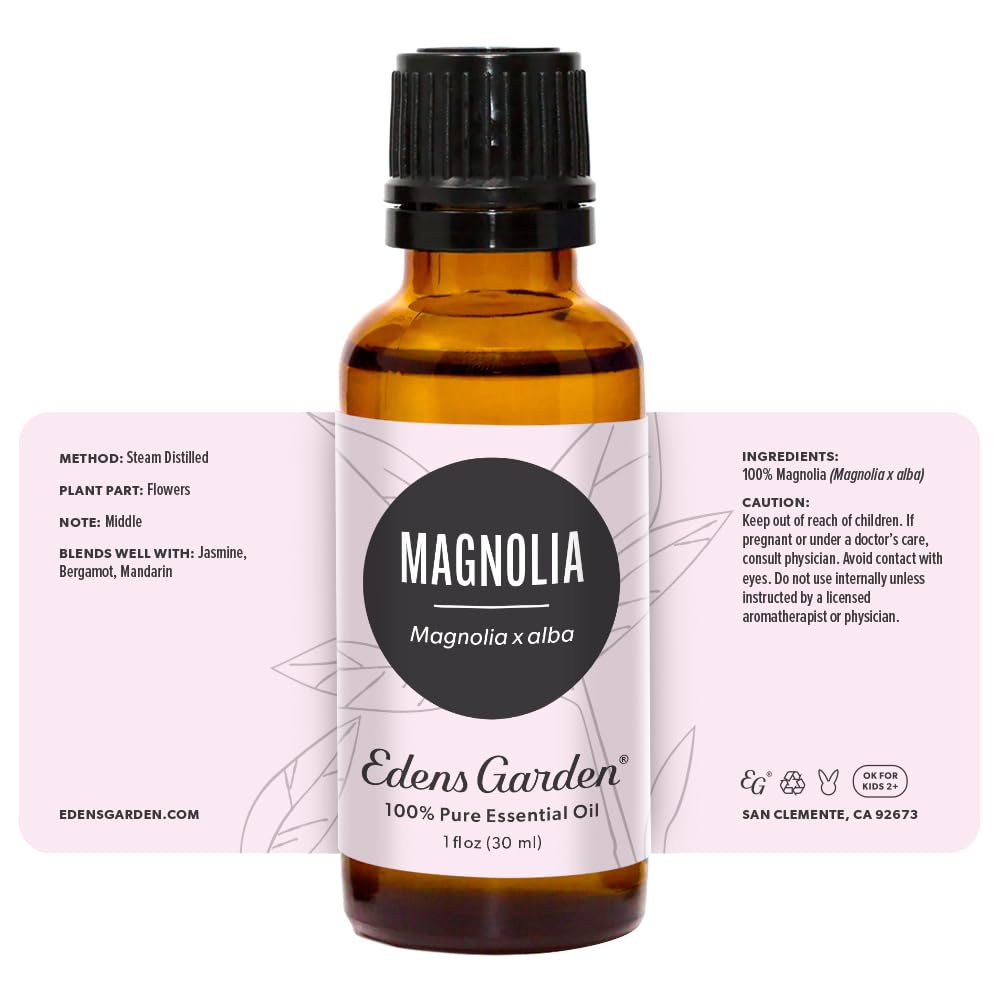 Edens Garden Magnolia essential oil on a shelf as part of aromatherapy collection.