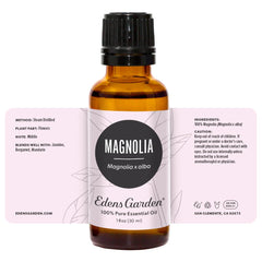 Edens Garden Magnolia essential oil on a shelf as part of aromatherapy collection.