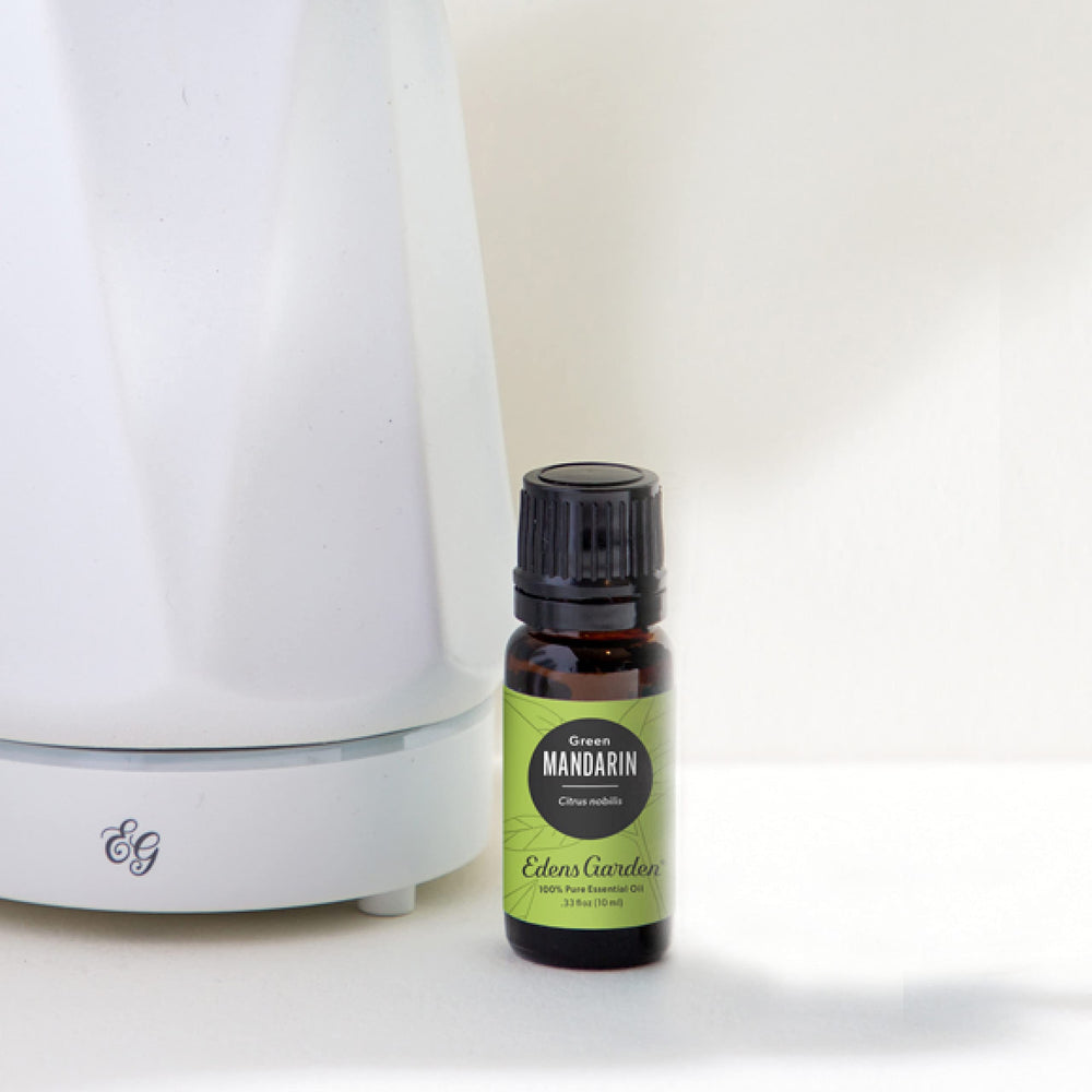 Edens Garden Mandarin-Green essential oil diffuser scene, highlighting citrus fragrance and uplifting ambiance.