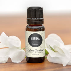 Close-up of Edens Garden Manuka essential oil dropper for precise usage.
