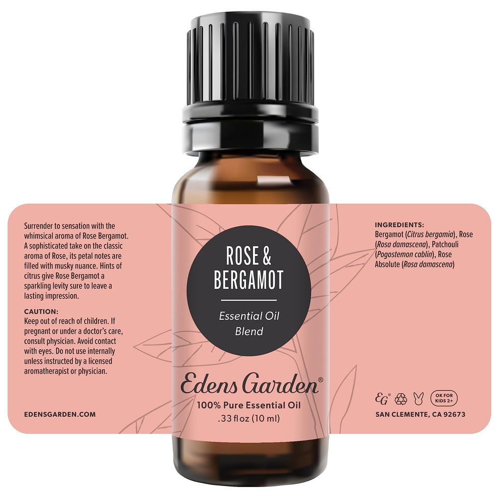Edens Garden Rose Bergamot bottle in dusk light evokes romance.