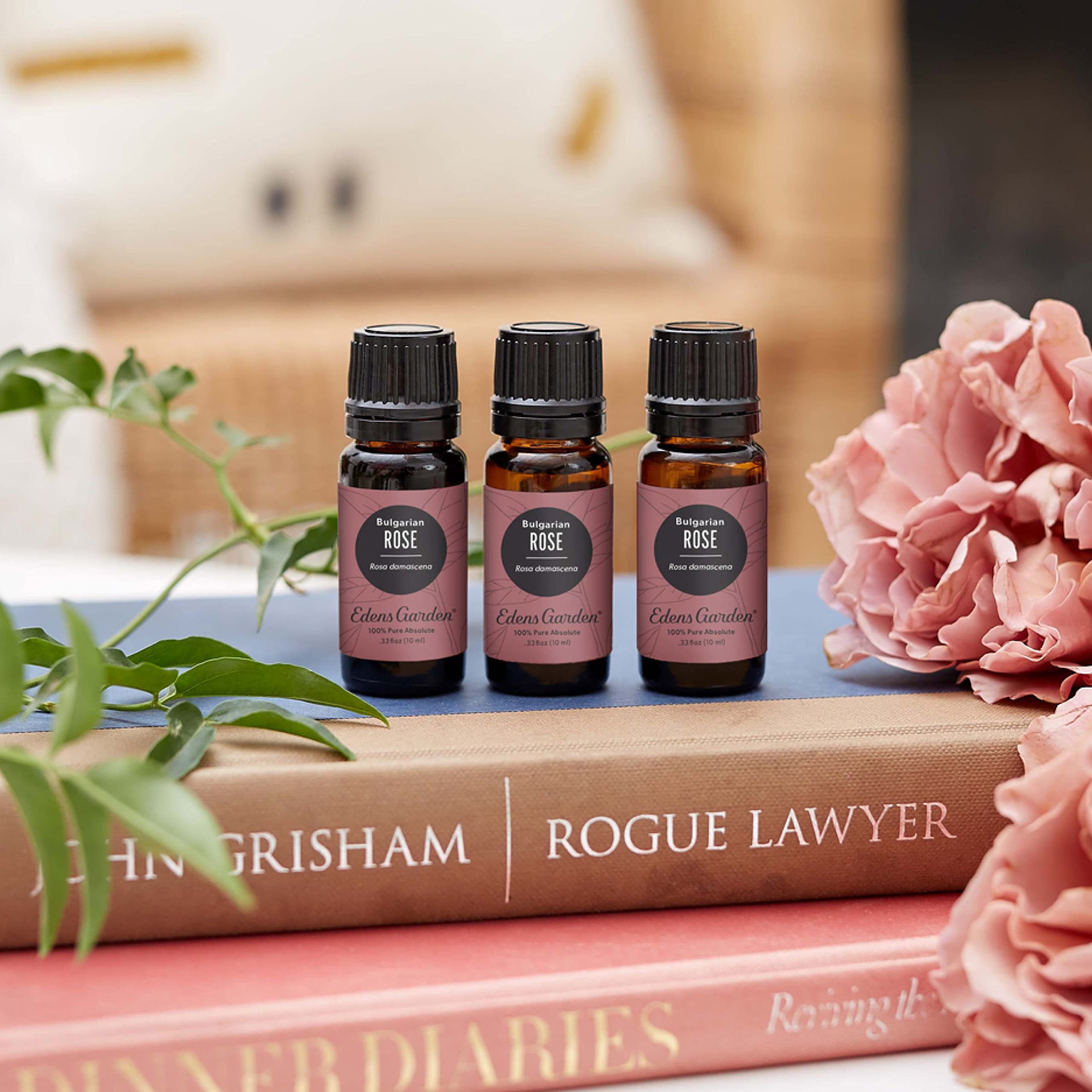 Edens Garden Rose Bulgarian Absolute pour close-up for precise drops in skincare and diffusion.