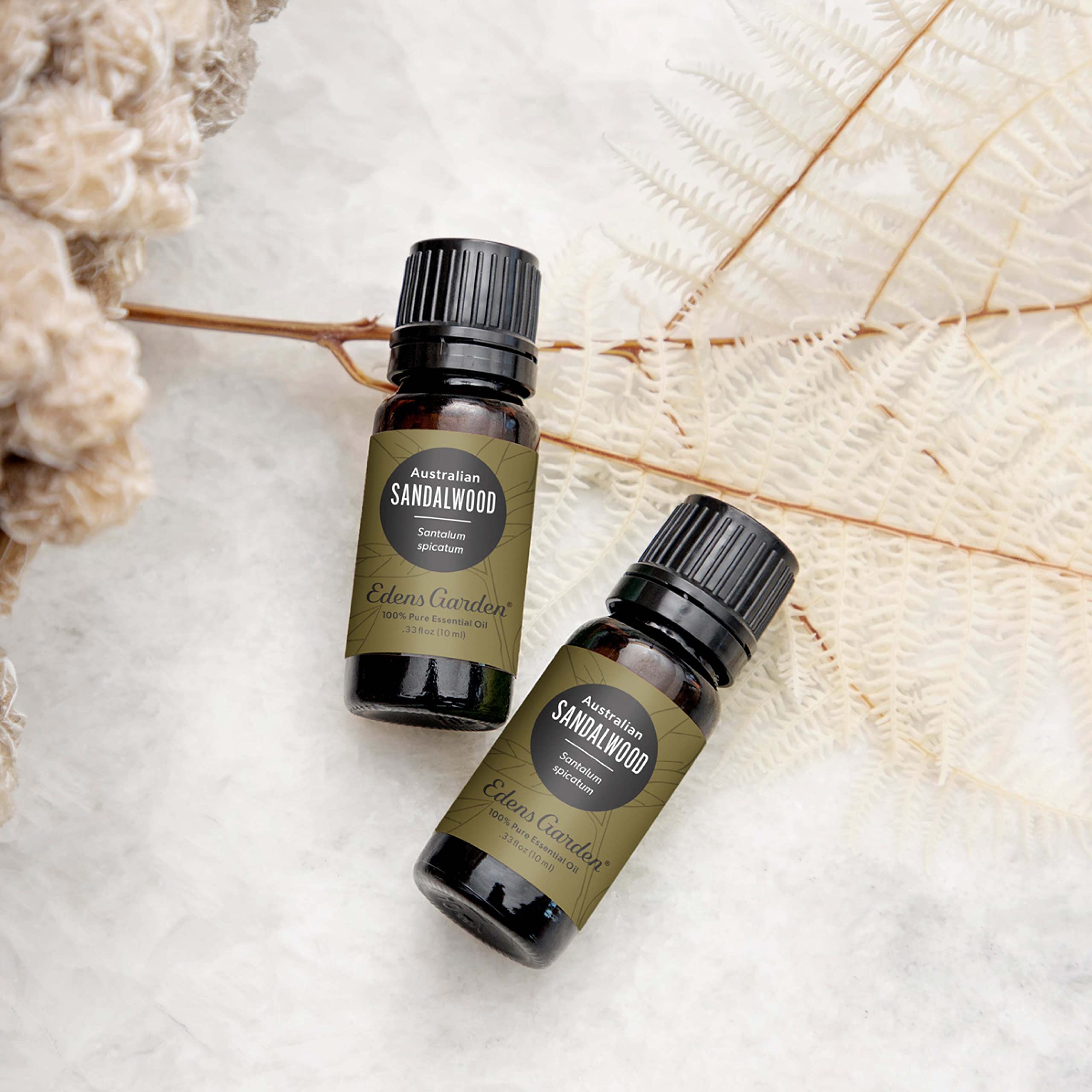 Edens Garden sandalwood essential oil diffuser releasing a grounding aroma.