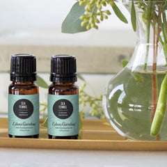 Edens Garden Sea Fennel oil dropper ready for precise topical application.