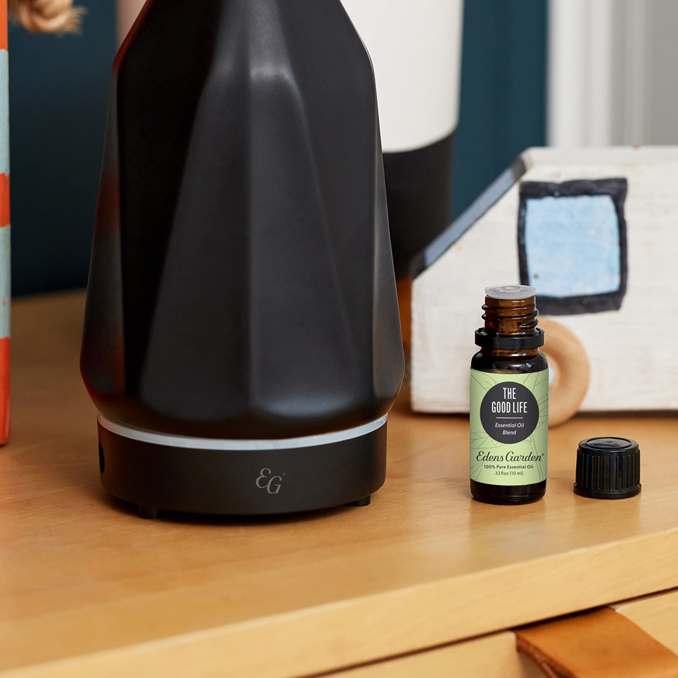Edens Garden The Good Life diffuser in room illustrates a calming aroma for home ambience.