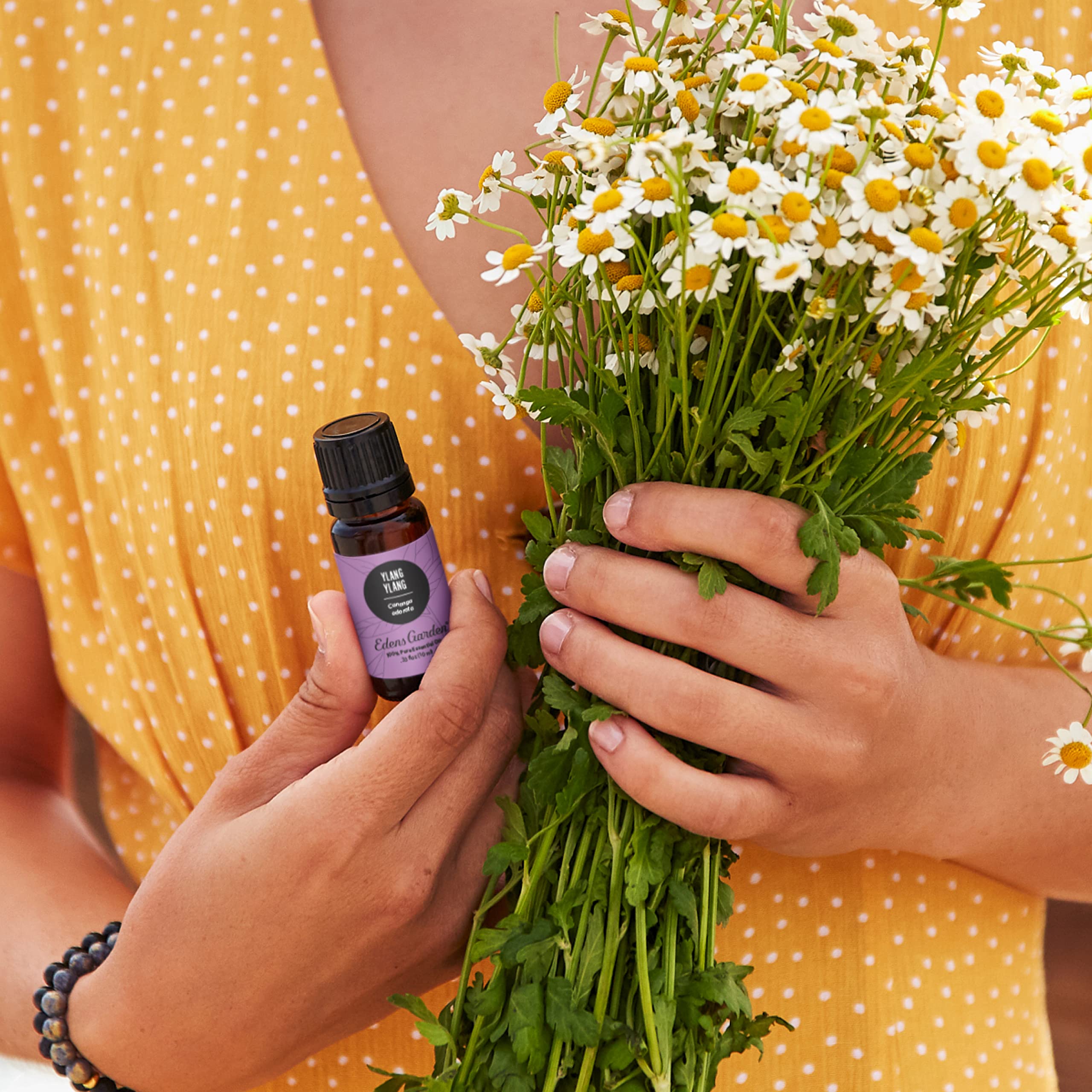 Edens Garden Ylang Ylang diffuser emits a sweet floral aroma for relaxation.