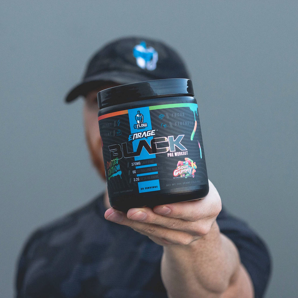 Powder being dispensed from tub for quick pre-workout mix