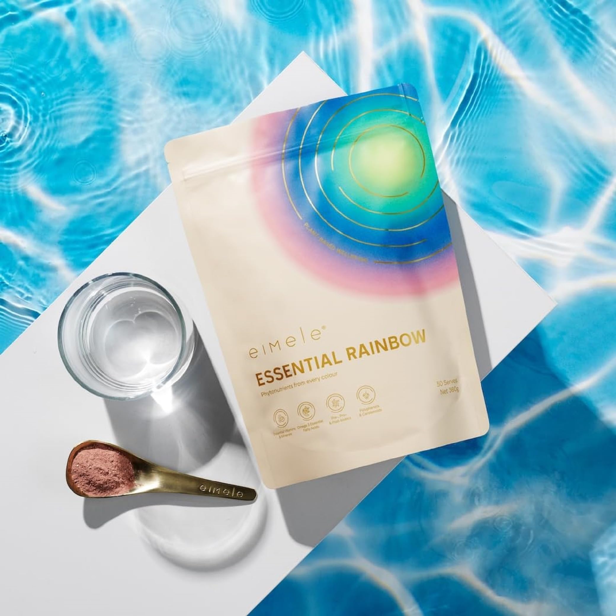 eimele Essential Rainbow packaging showcased with non-GMO claim.
