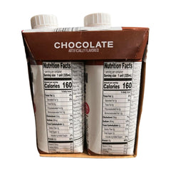 Elevation by Millville vanilla protein shake glass pour for quick nutrition.