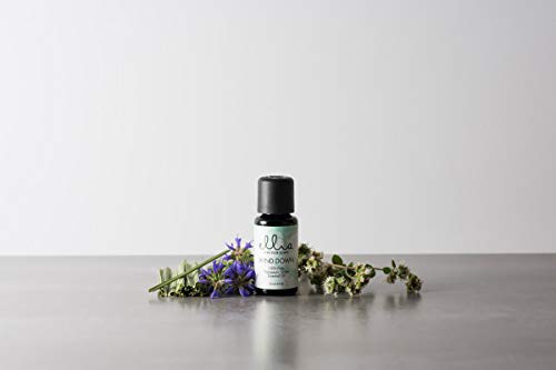 Ellia Wind Down aromatherapy scene highlights lavender-sage-cardamom blend for restful relaxation.