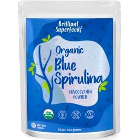 Ellie\'s Best blue spirulina powder bottle front shows a vivid indigo color for smoothies.
