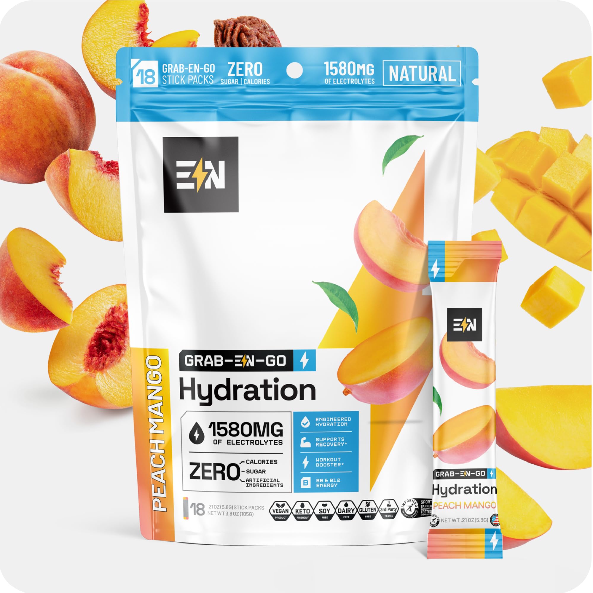 Engineered Nutrition peach mango electrolyte packets dissolve in water for refreshing hydration.