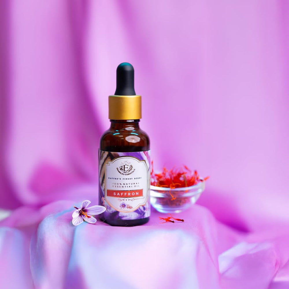 Enhanced Essentials Saffron Essential Oil amber bottle on display for long-lasting fragrance.