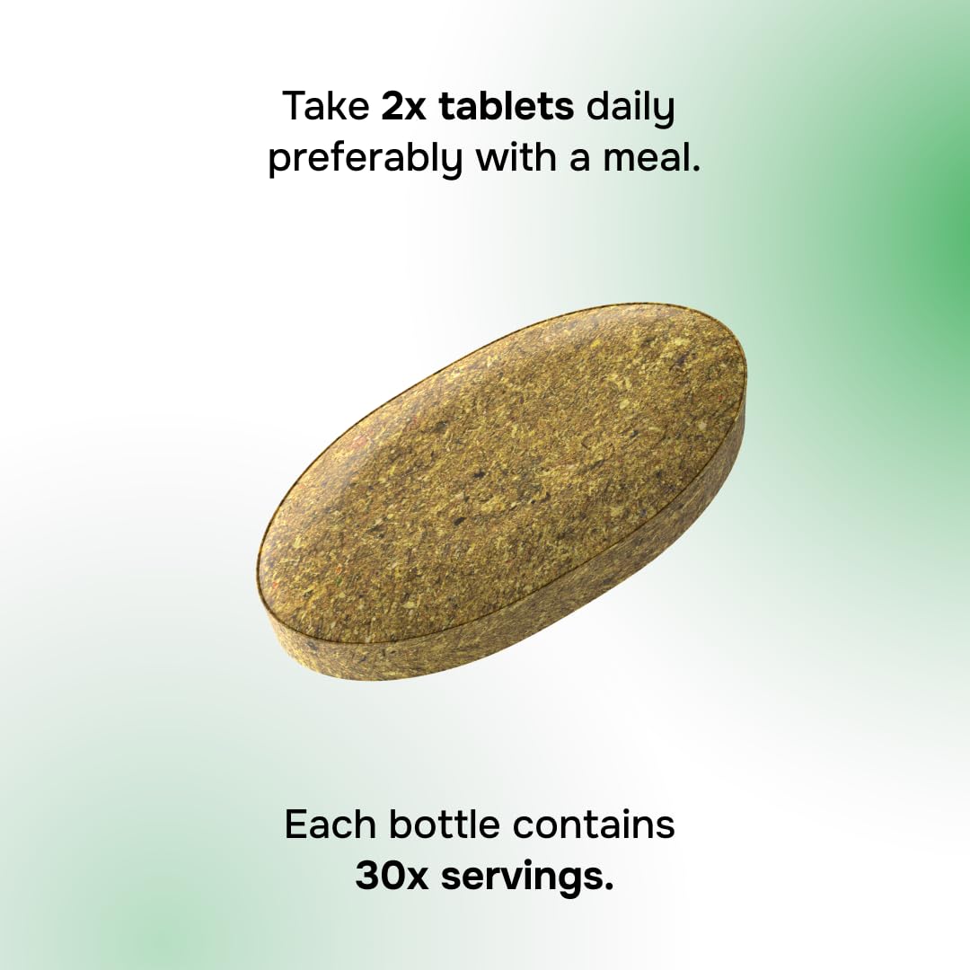 Envitamin Green Fuel tablets in a glass with water for convenient intake