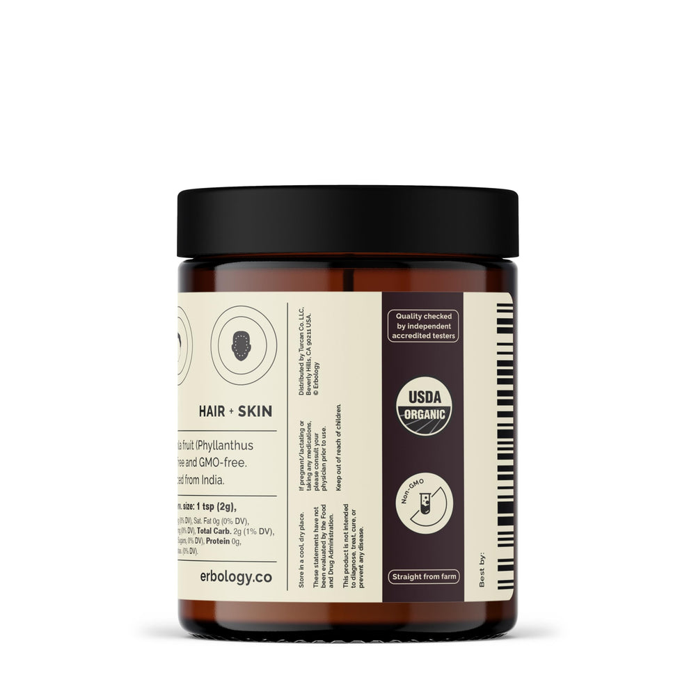 Scoop measures amla powder for everyday use and adds to beverages.