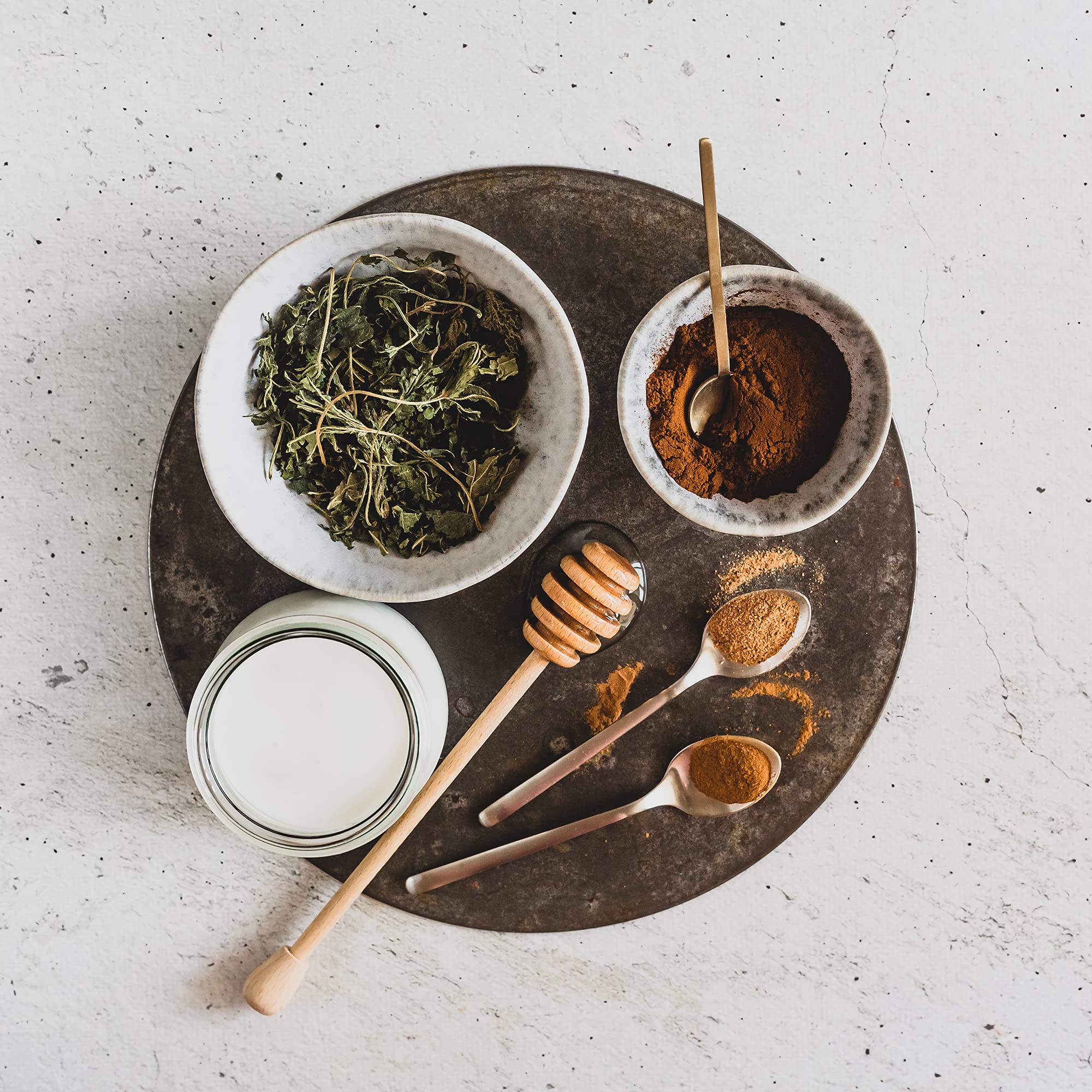 Erbology Chaga powder stirred into coffee for a warm morning ritual