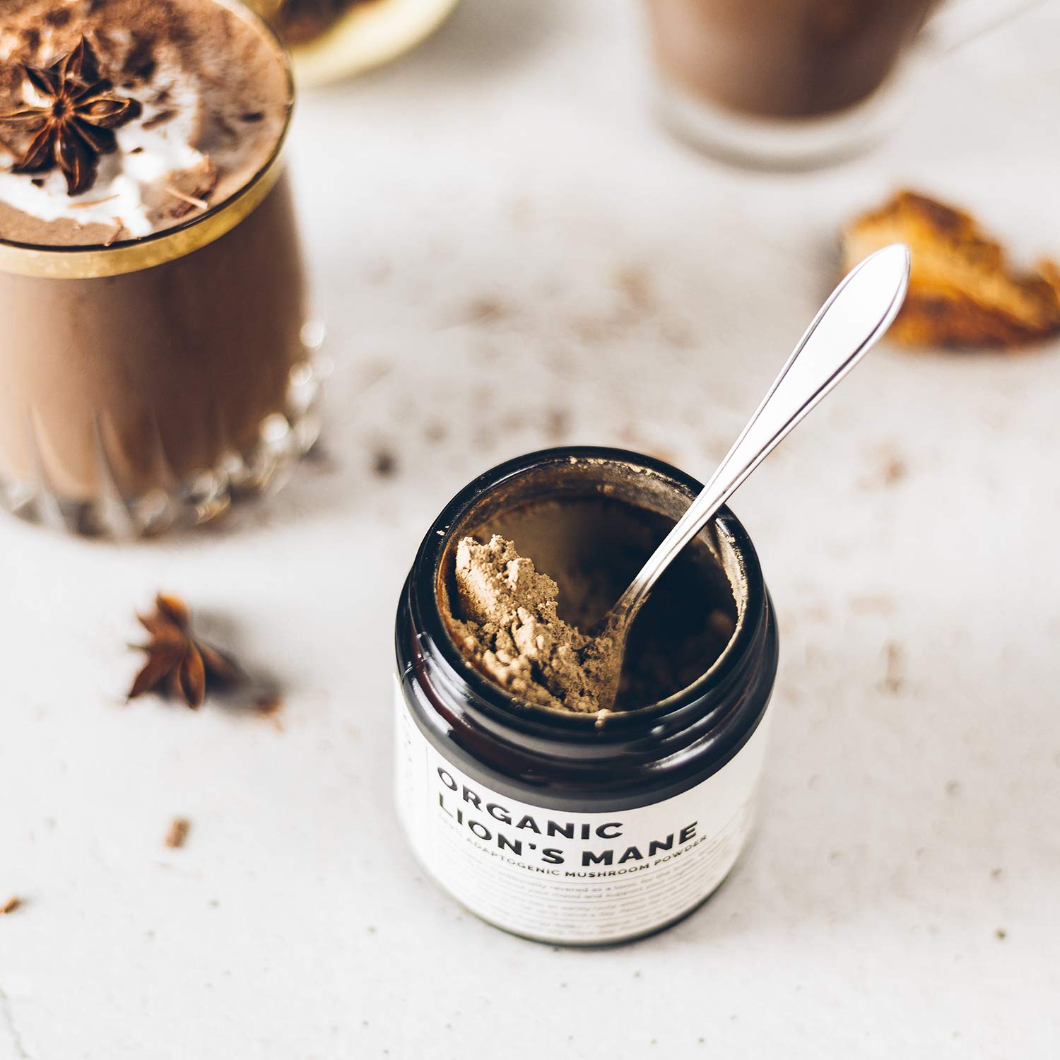 Erbology Lion's Mane powder dissolves smoothly in hot coffee for a gentle focus