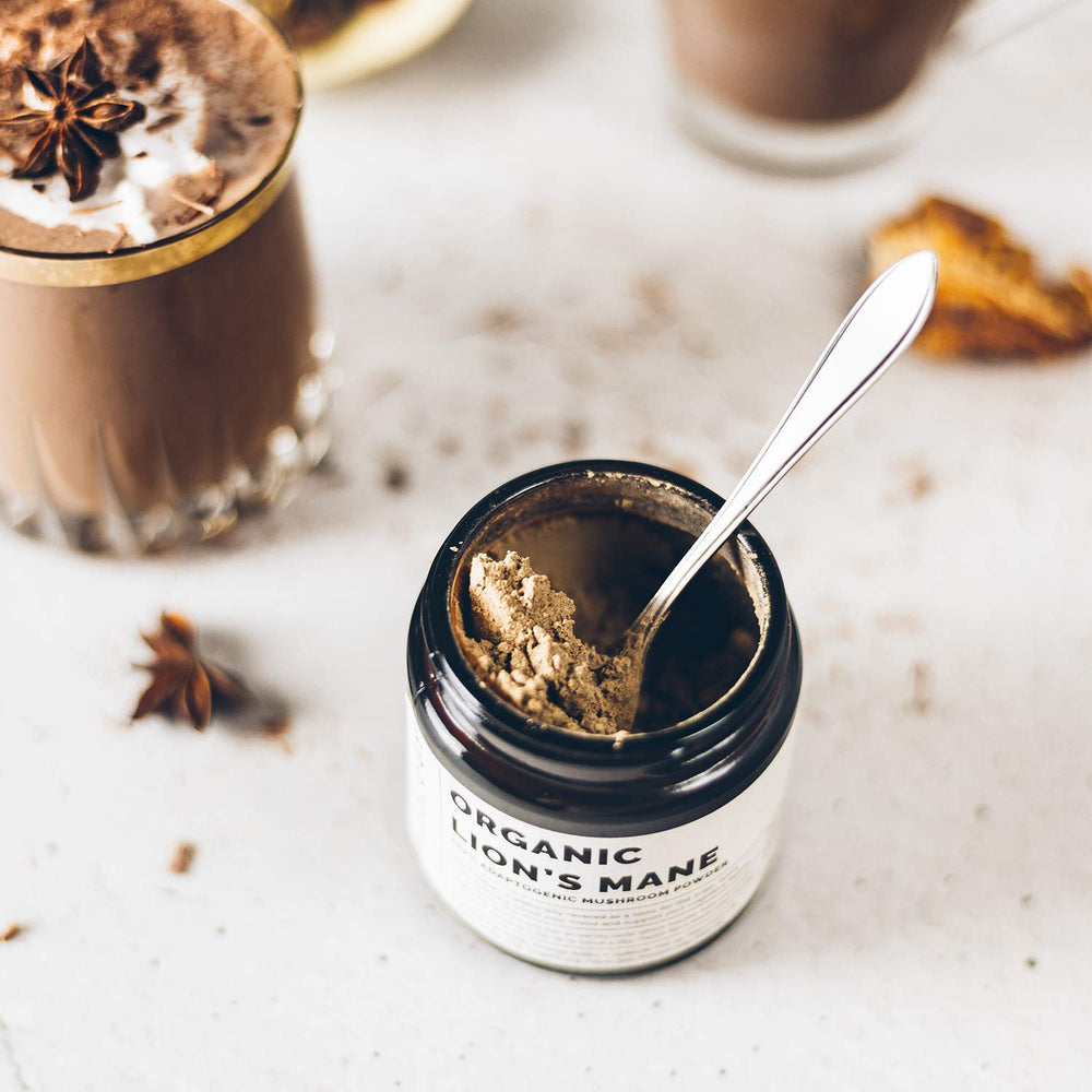 Erbology Lion's Mane powder dissolves smoothly in hot coffee for a gentle focus