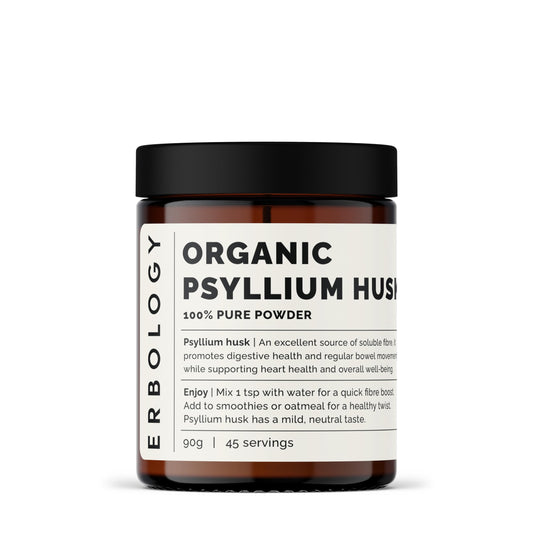 Erbology psyllium husk powder bottle on a kitchen counter, ready to mix for daily fiber