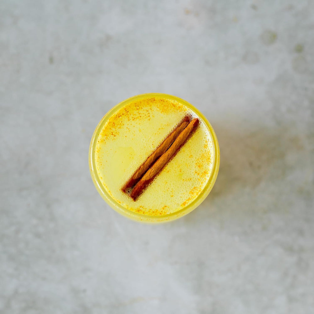 Erbology turmeric powder in a kitchen scene suggesting versatile daily use