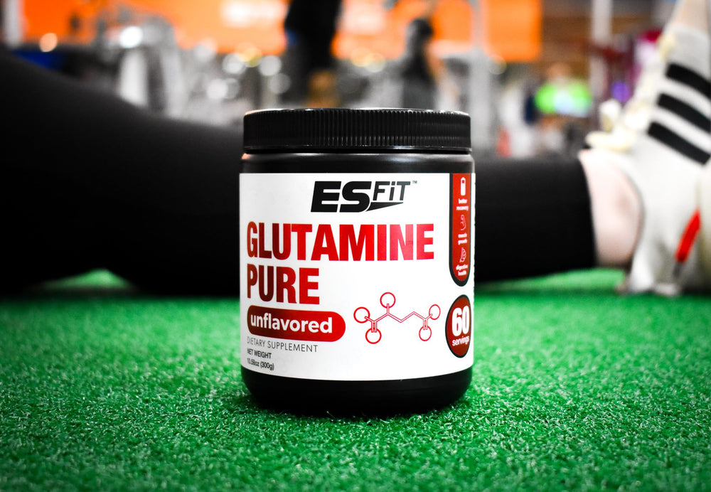 ES FIT Glutamine powder in a glass after mixing for recovery