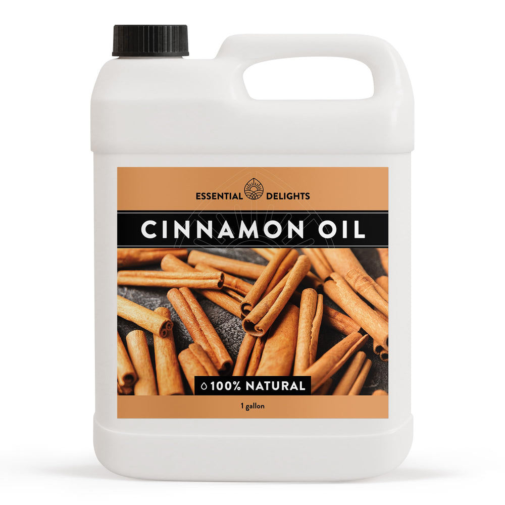 Cinnamon Essential Oil by Essential Delights shown with a diffuser for aroma diffusion.