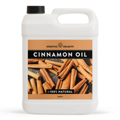 Cinnamon Essential Oil by Essential Delights shown with a diffuser for aroma diffusion.