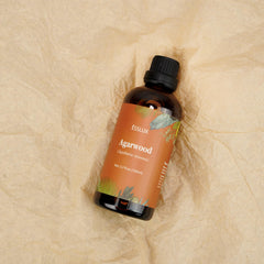 ESSLux agarwood oil bottle with cap dropper enables precise pouring.