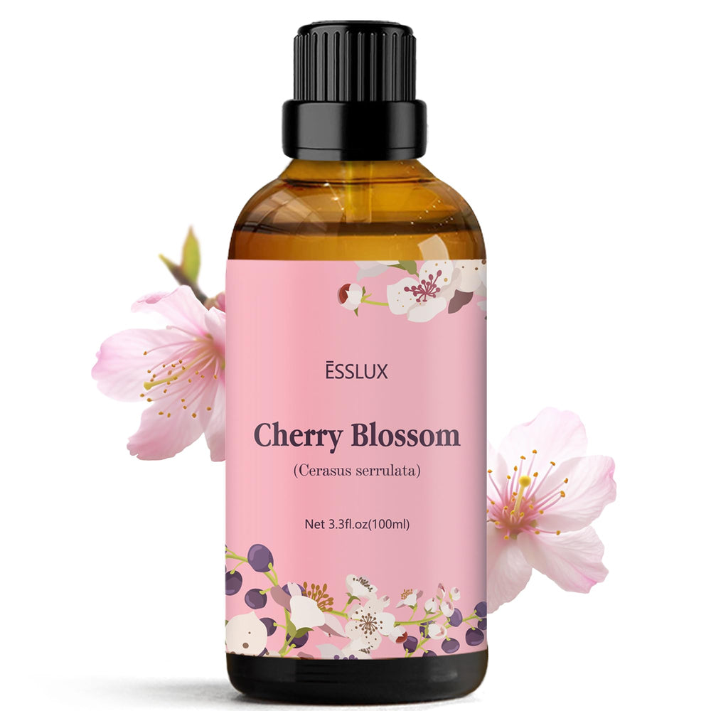 ESSLUX Cherry Blossom essential oil bottle pouring for diffuser use and relaxation