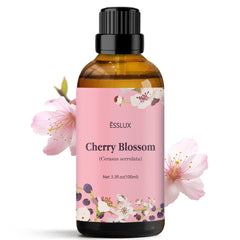 ESSLUX Cherry Blossom essential oil bottle pouring for diffuser use and relaxation