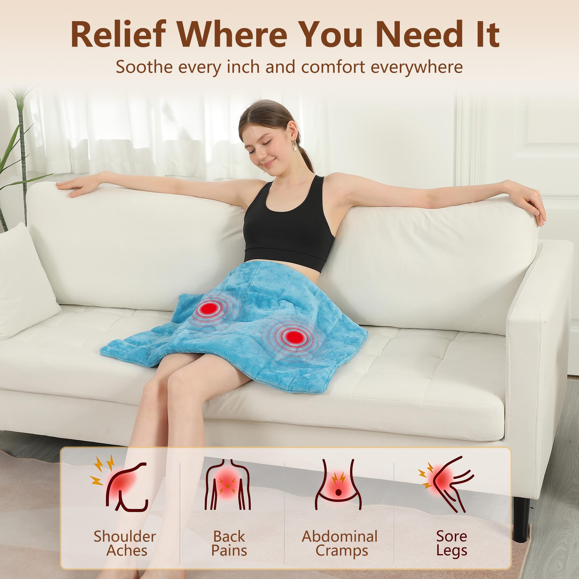 ESTINGO royal-blue heating pad on couch illustrates cozy comfort for relaxation.