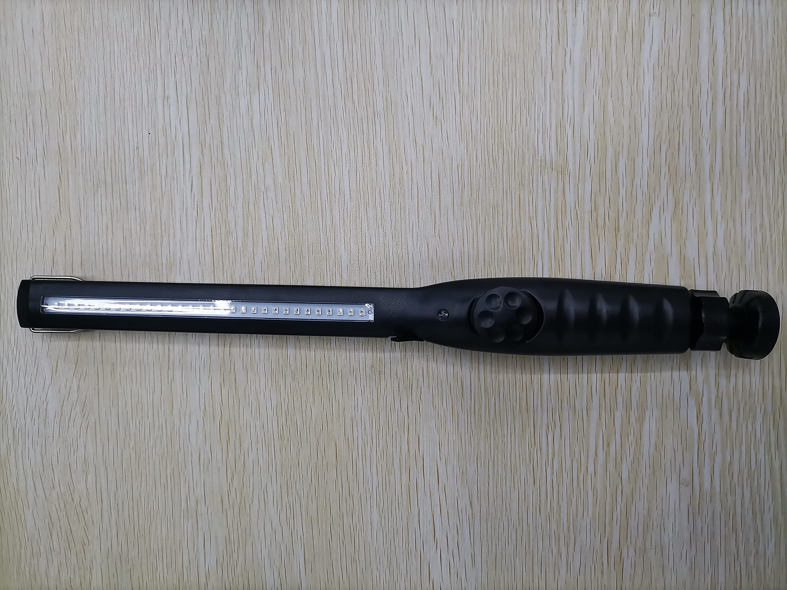 ESUEXO UV Light Sanitizer Wand used on phones and keys.