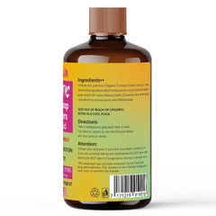 ESUNM Herbal Detox Soursop Bitters glass served with fruit for a refreshing wellness moment.