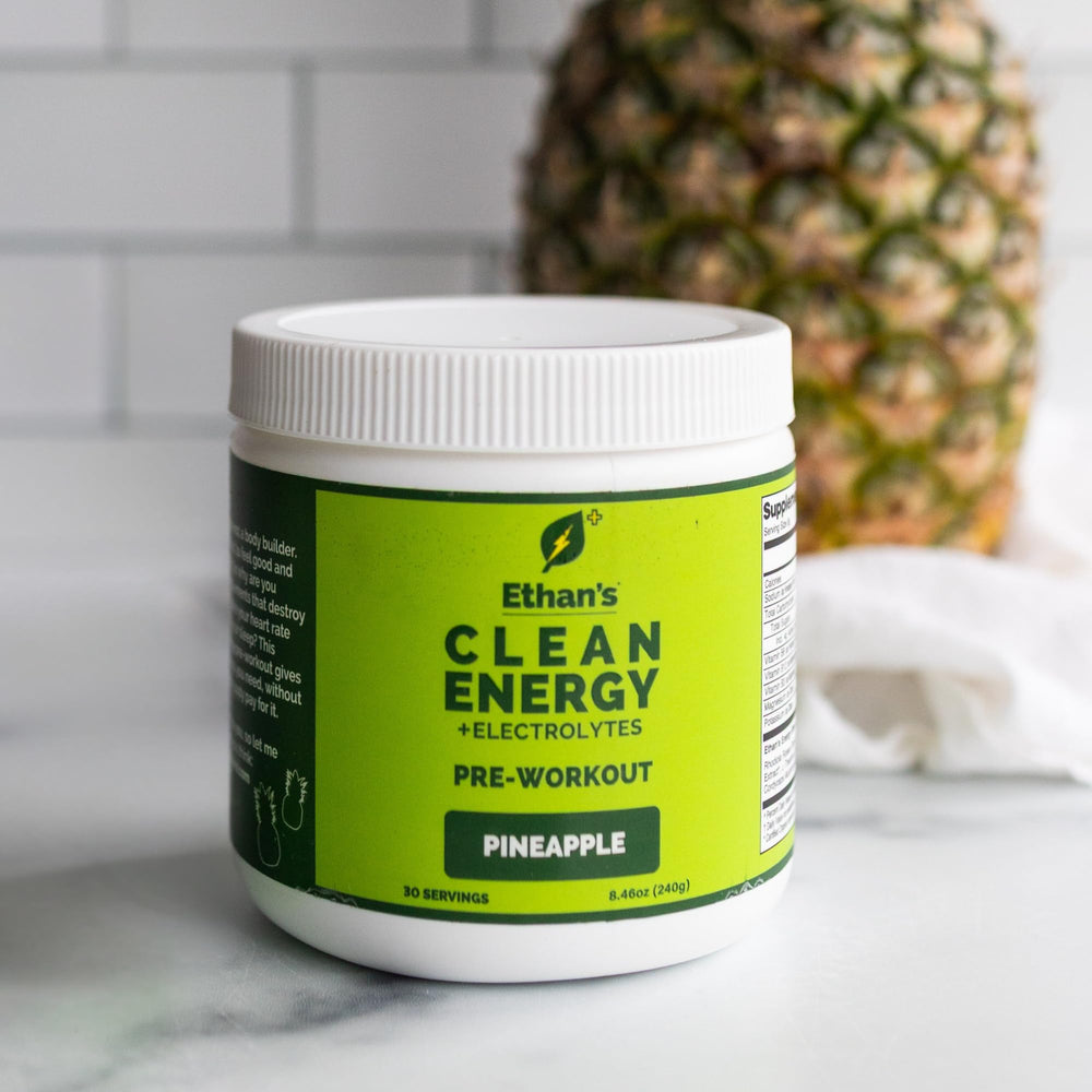 Ethan's Feel Good pineapple powder with scoop—easy pre-workout mix.