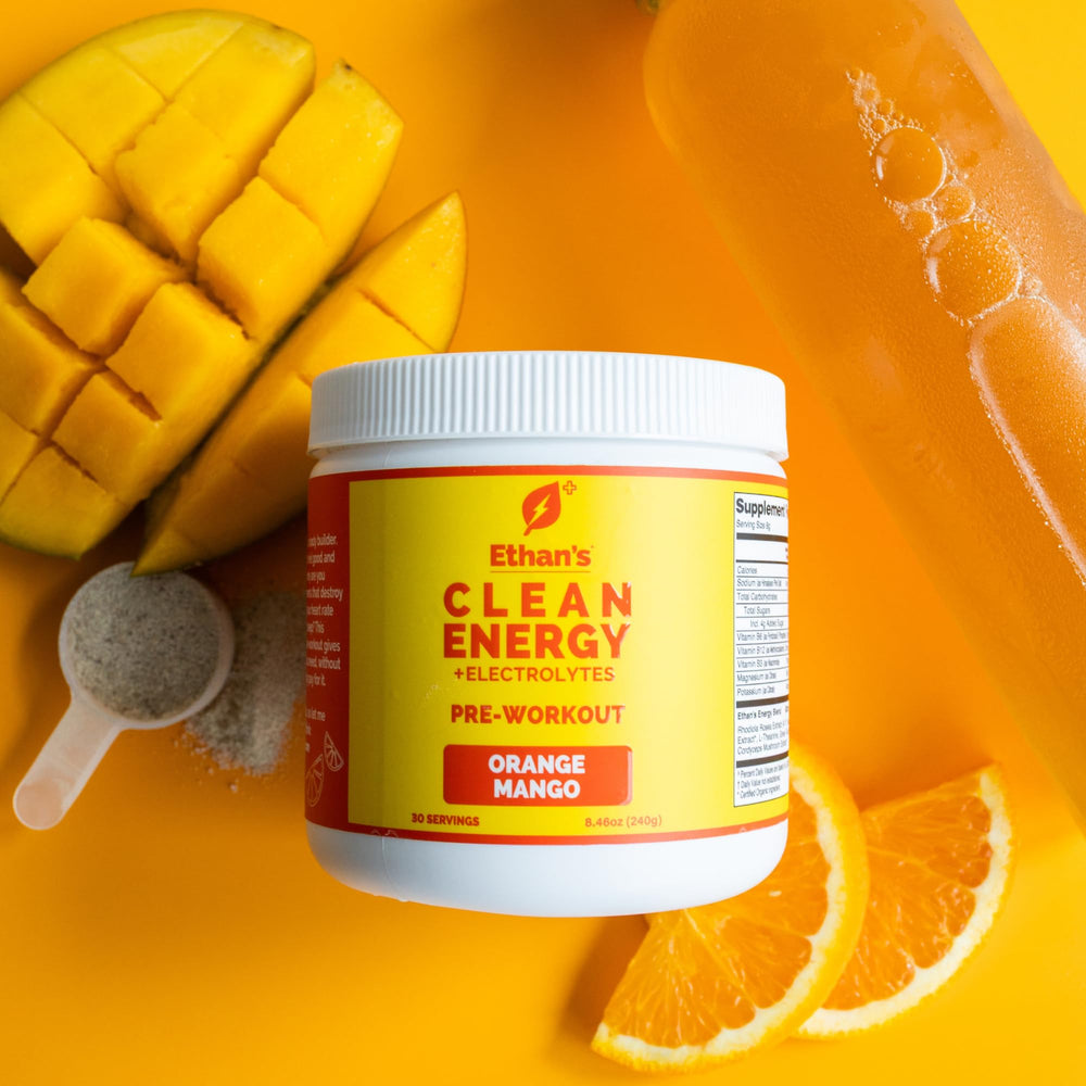 Scoop-dispense of Ethan's Feel Good pre-workout orange mango powder.