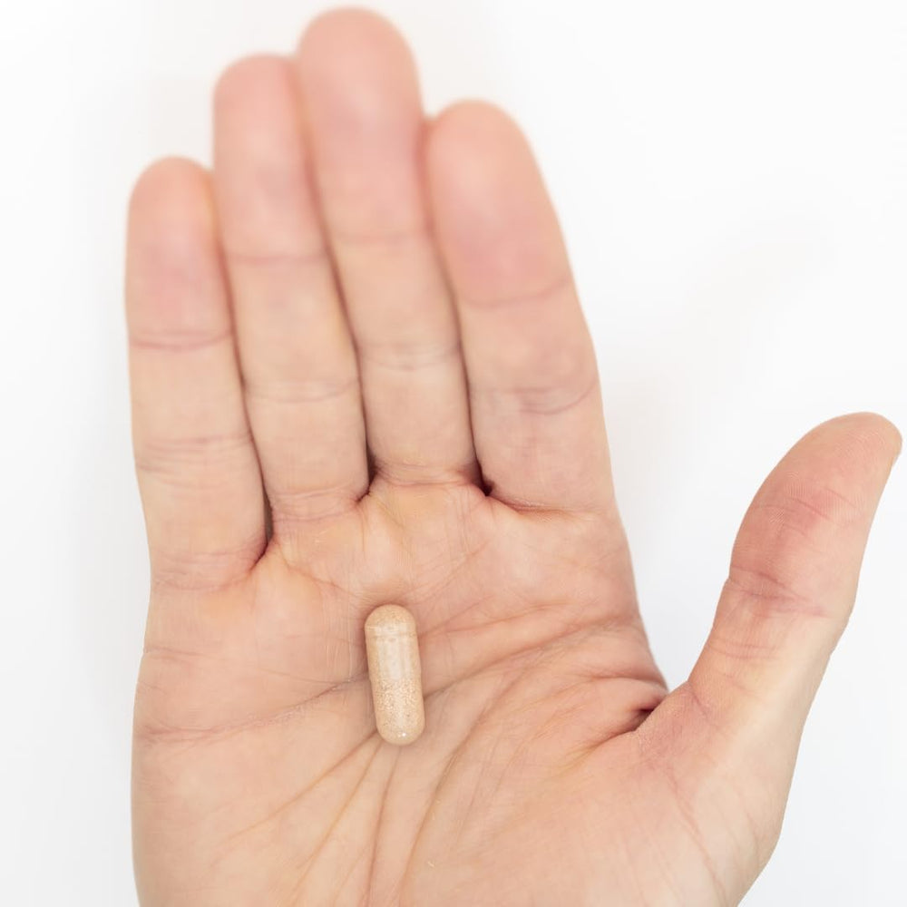 Ethlete NAD+ capsules in hand ready for workouts.