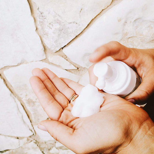 Everest Microbial Defense foaming sanitizer being rubbed in, leaving soft, moisturized skin.