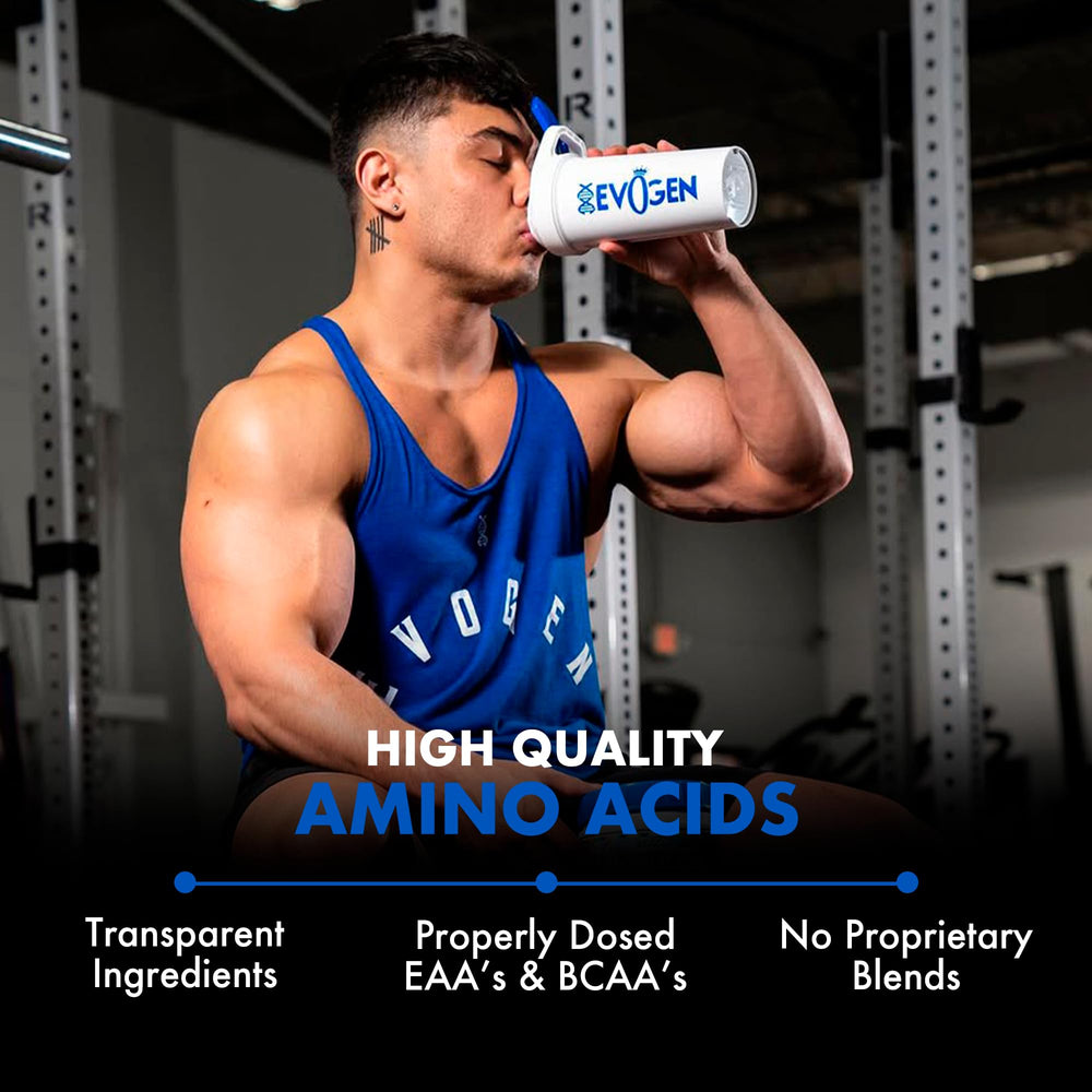 Pouring Evogen Amino K.E.M. into a glass for hydration during training.
