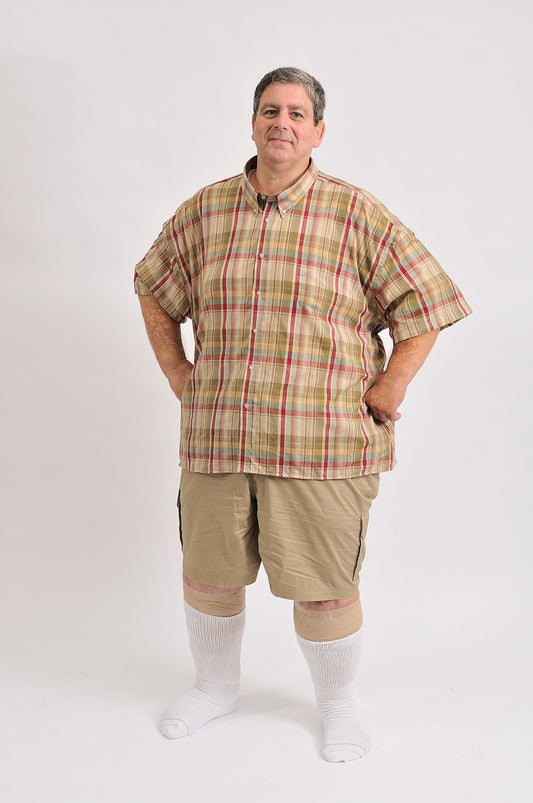 Extra Wide medical mid-calf crew socks stretched at the cuff, showing non-binding fit for swollen ankles.