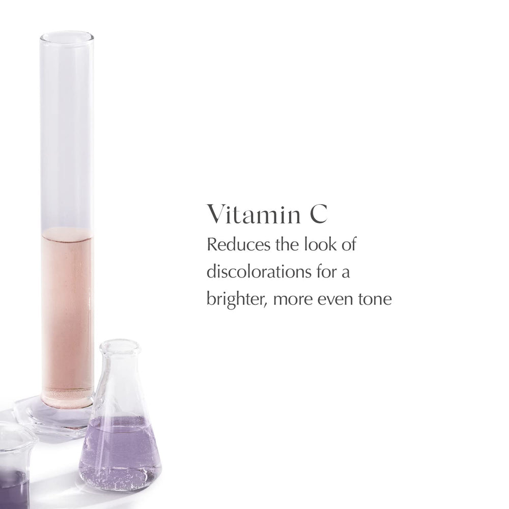EXUVIANCE serum being applied on clean skin for smoother look.