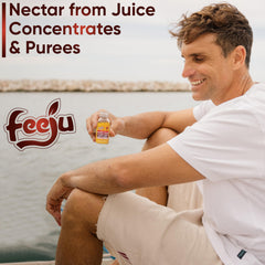 Feeju Mango Nectar Blend glass serve presents refreshing tangy spicy flavor ready to drink