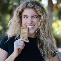 FEEL vegan protein bars packaging on a clean surface showcases allergen-friendly promise