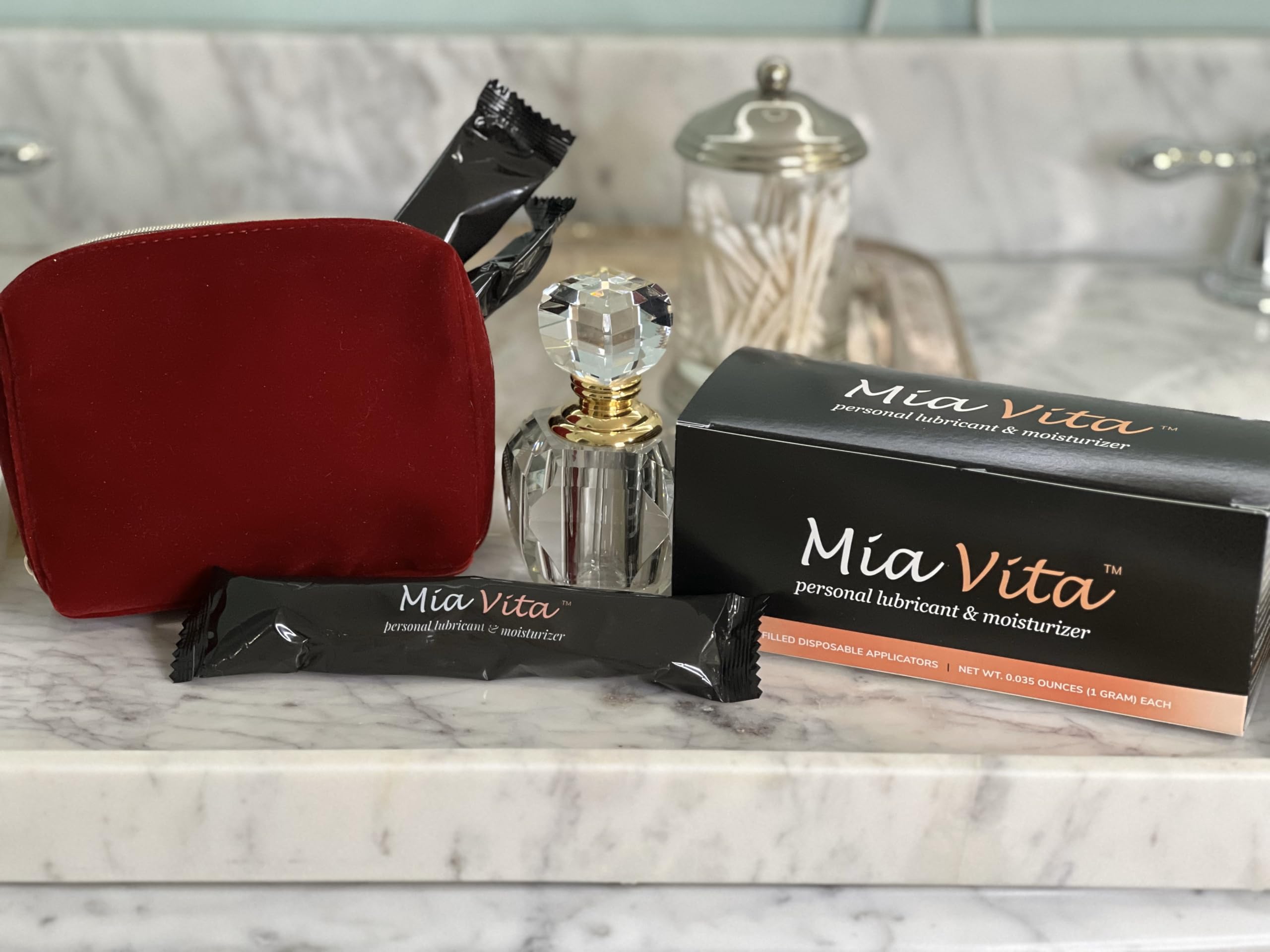 Mia Vita with condoms and sex toys demonstrating compatibility