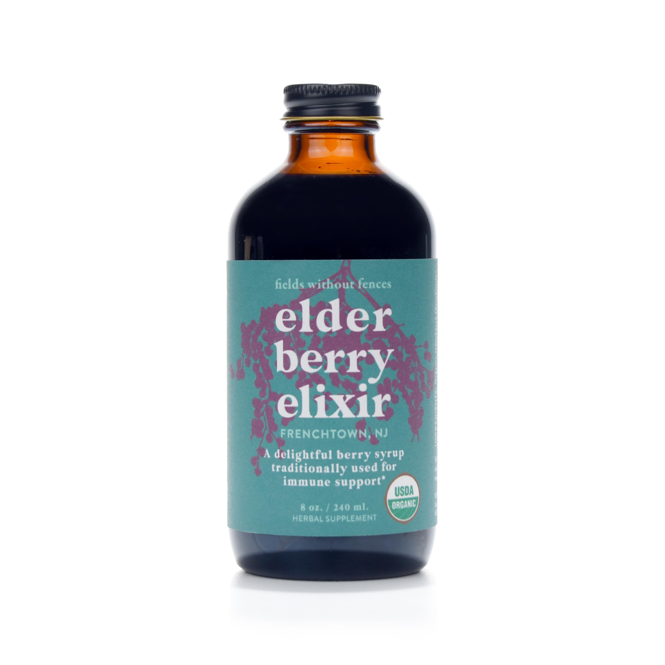 Fields Without Fences Elderberry Elixir bottle with label, highlighting organic elderberries for daily wellness ritual.