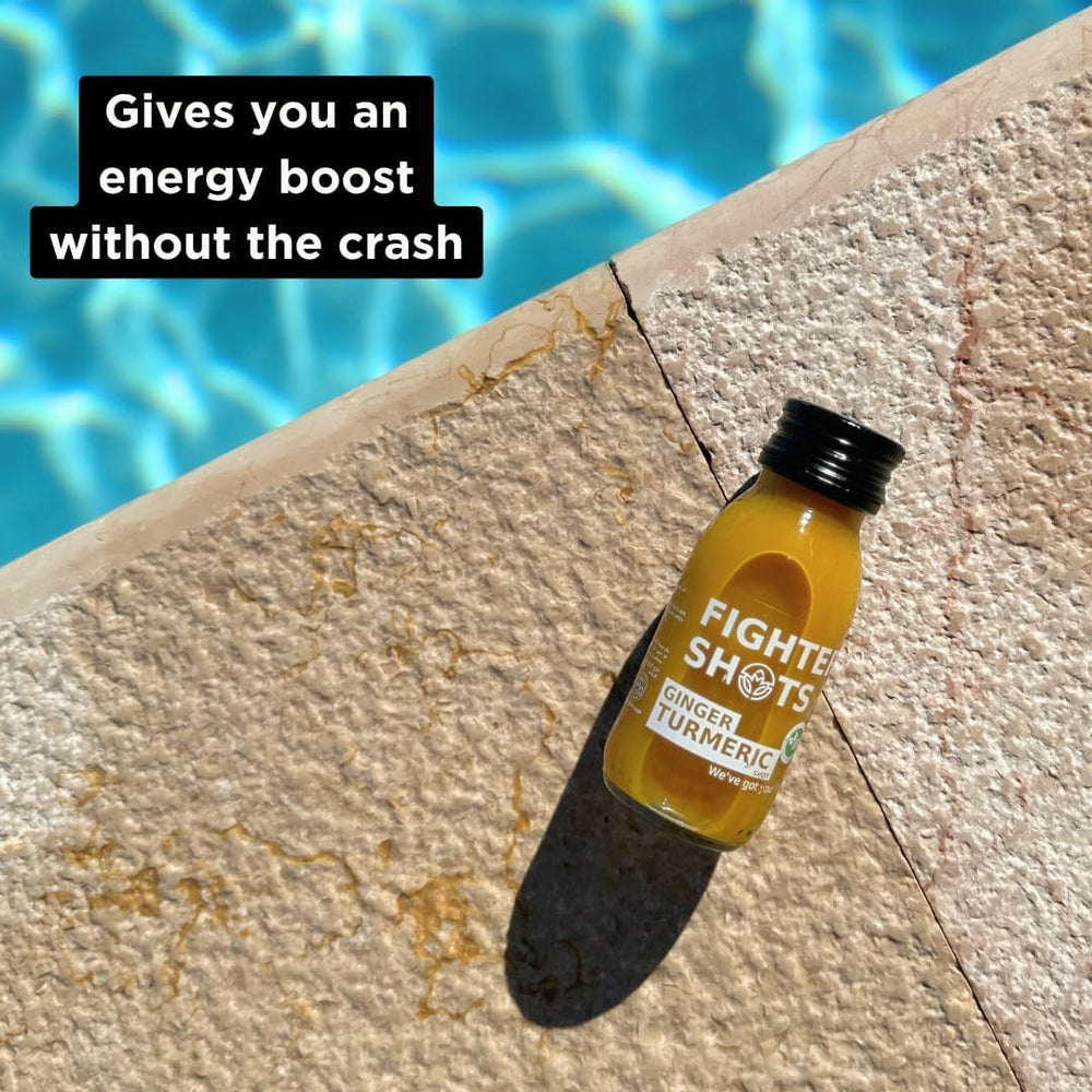 Fighter Shots bottle pour highlights fresh, cold-pressed wellness in a single serving