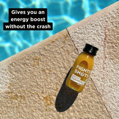 Fighter Shots bottle pour highlights fresh, cold-pressed wellness in a single serving