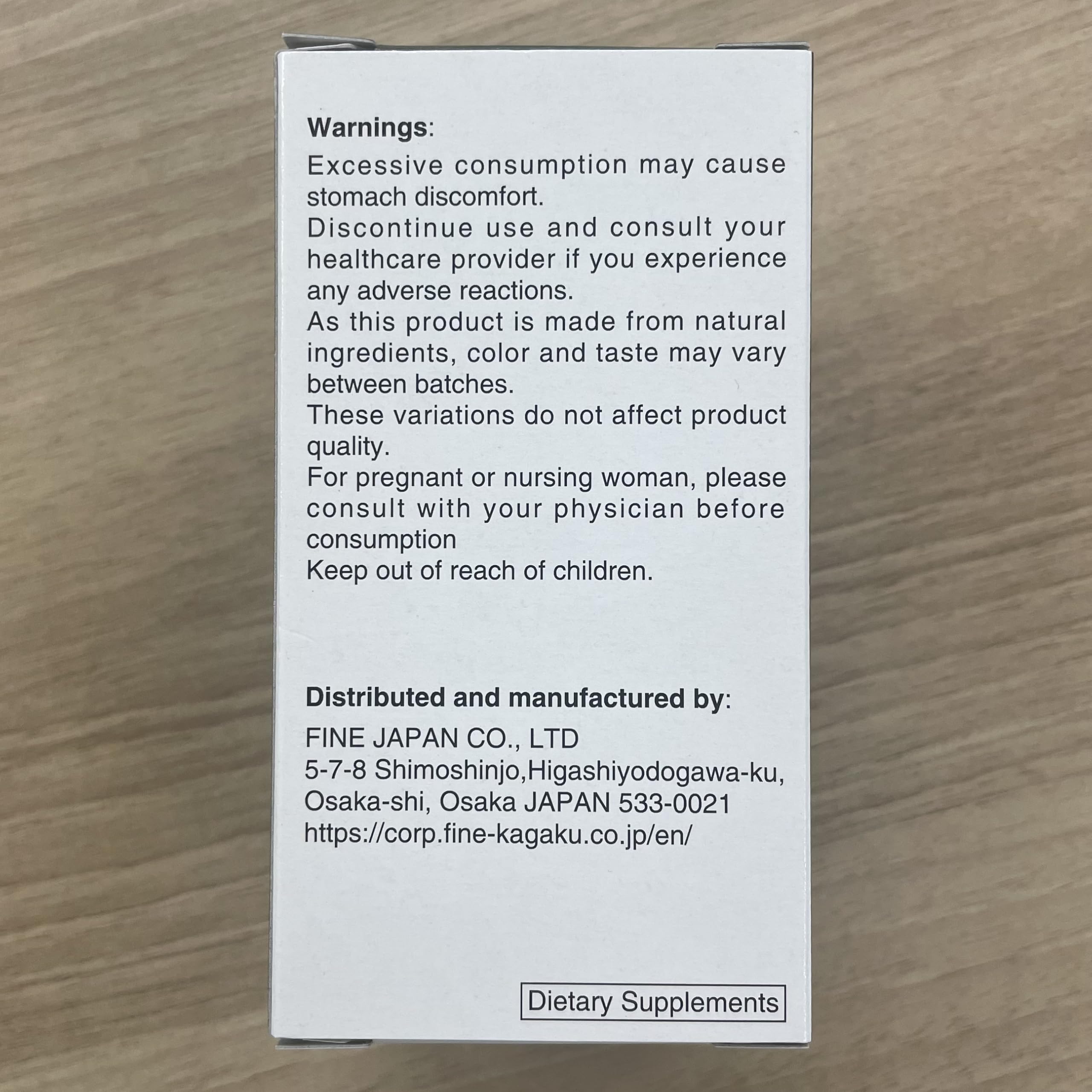 FINE JAPAN Fucoidan tablets closeup highlights vegetarian formula for plant-based use.