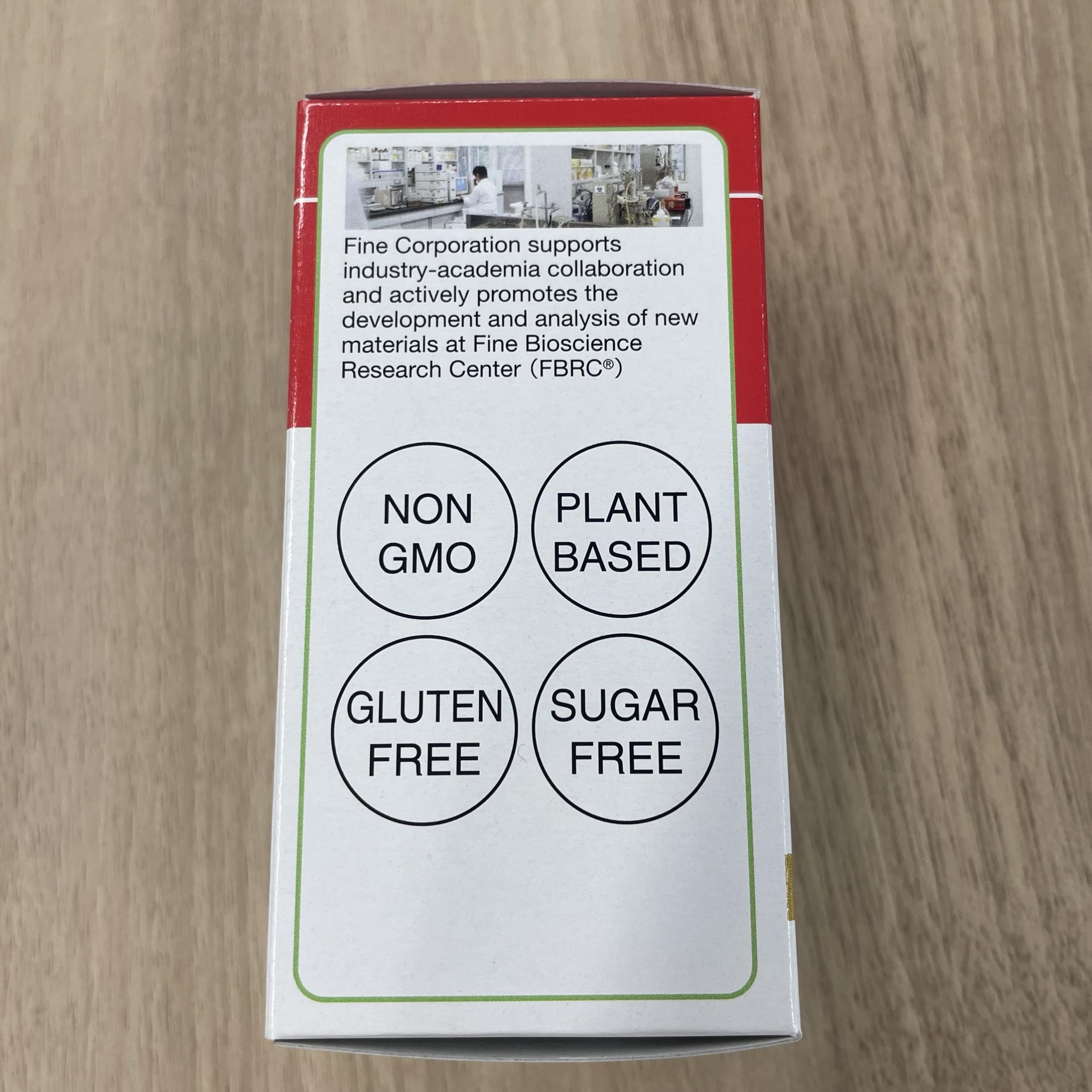 Fine Japan nattokinase tablet close-up ready to swallow