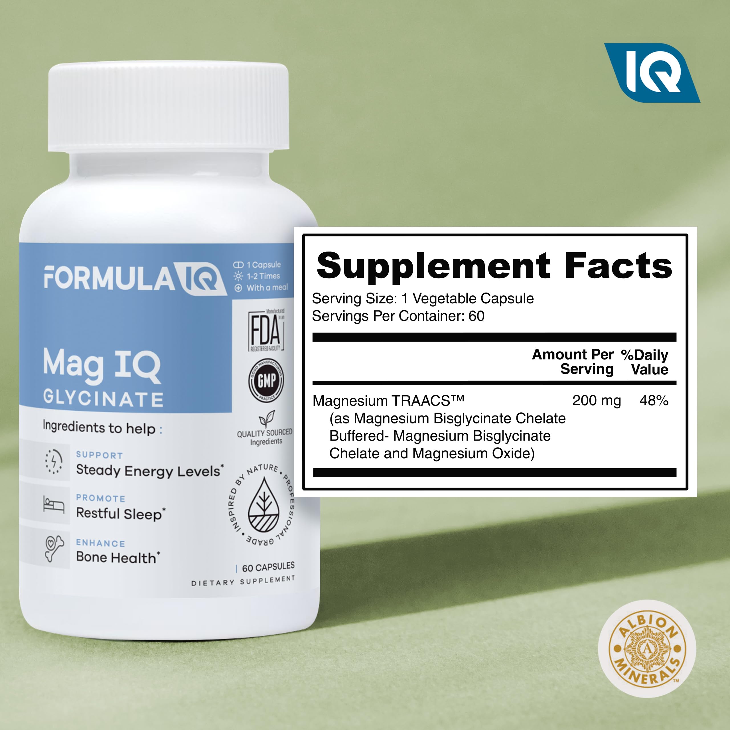 Hand holding FIQ Mag IQ capsules to illustrate easy daily intake.